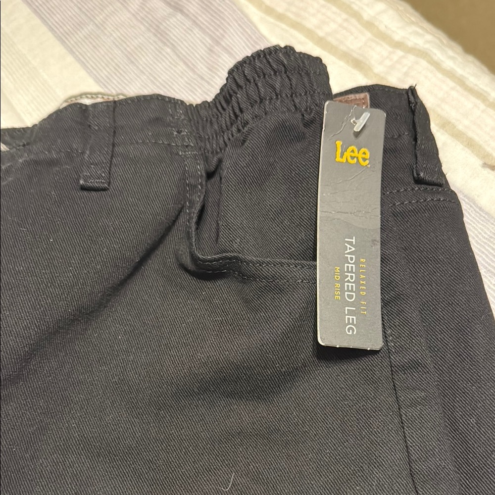 Lee Charcoal Tapered Leg jeans. Elastic on the side.   Size 16 short